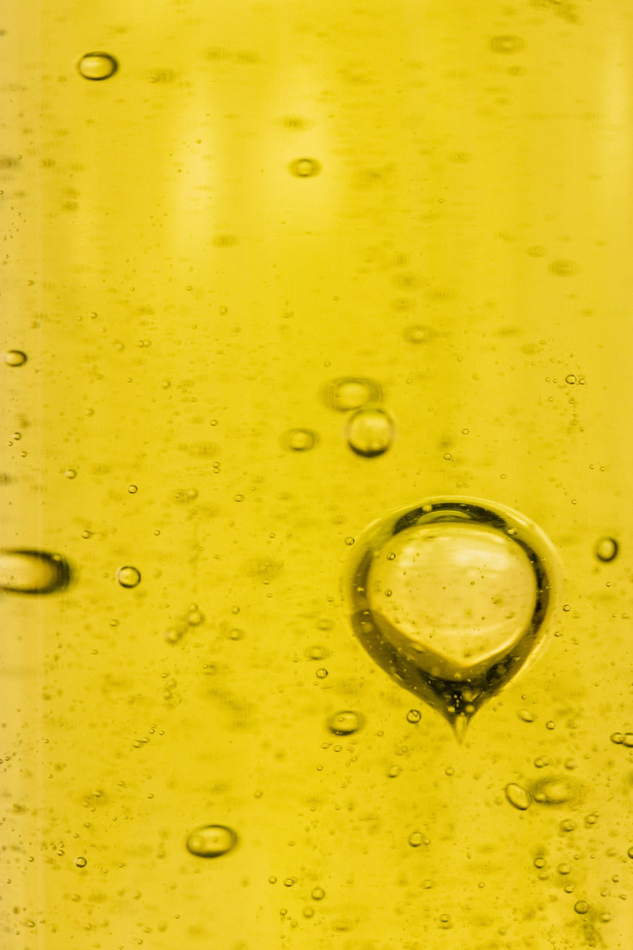 Golden plant oil in close-up